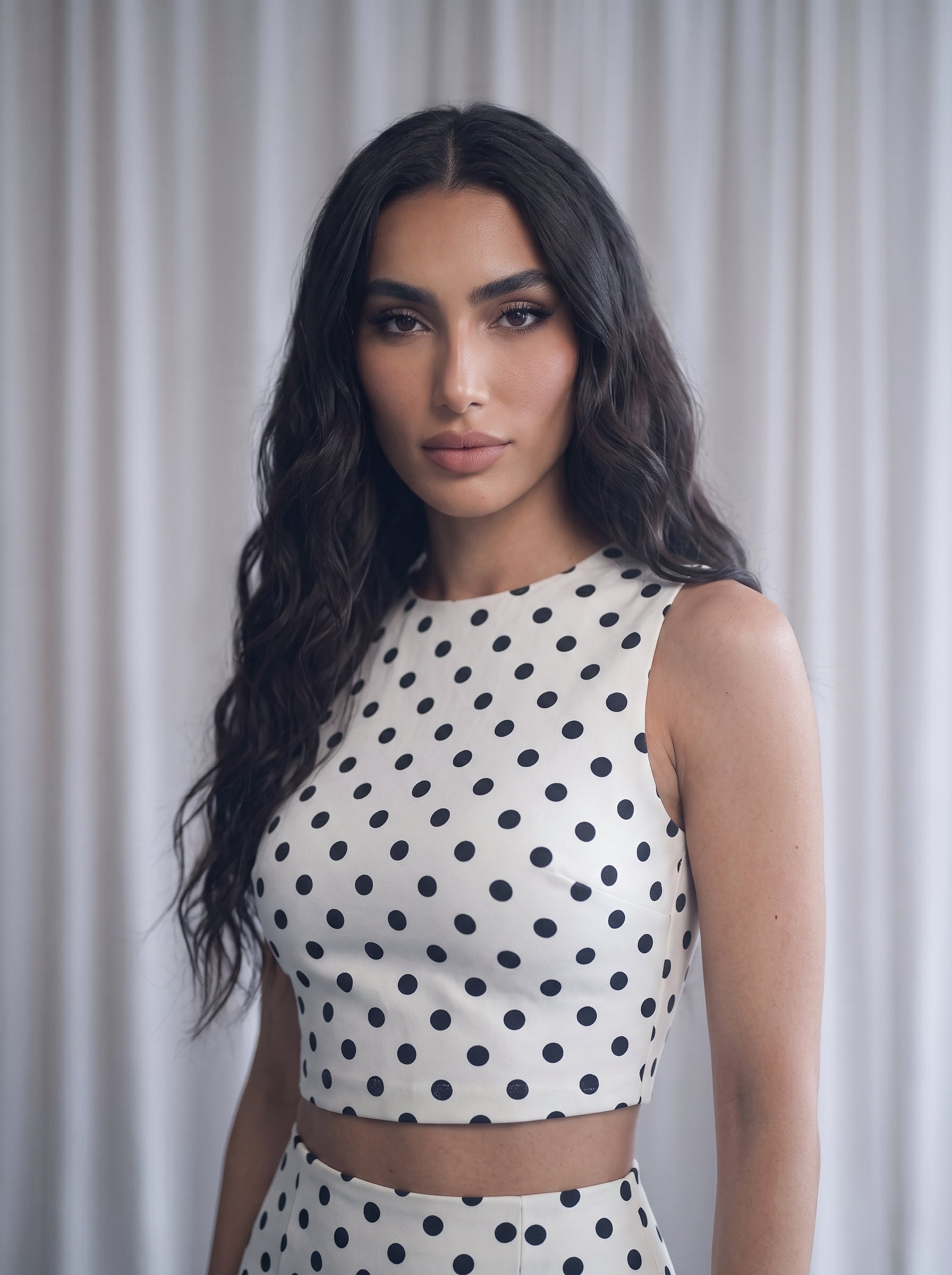 Matching two-piece co-ord set with a classic black-and-white polka dot pattern