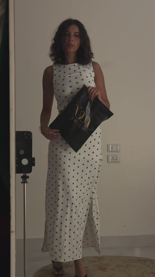 Matching two-piece co-ord set with a classic black-and-white polka dot pattern